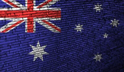 Australian flag with digital code overlay representing AML compliance.